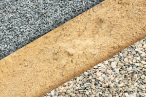 74281372 construction material in different aggregates stone chippings sand and gravel in top view for