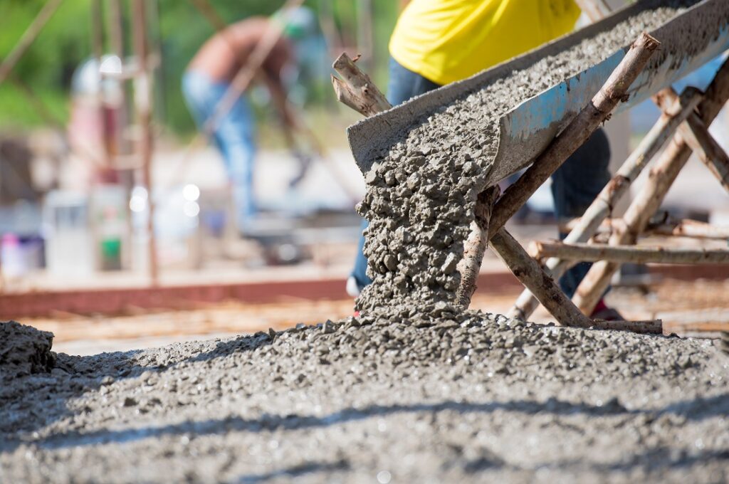 selective focus of concrete pouring during commercial concreting floors of building